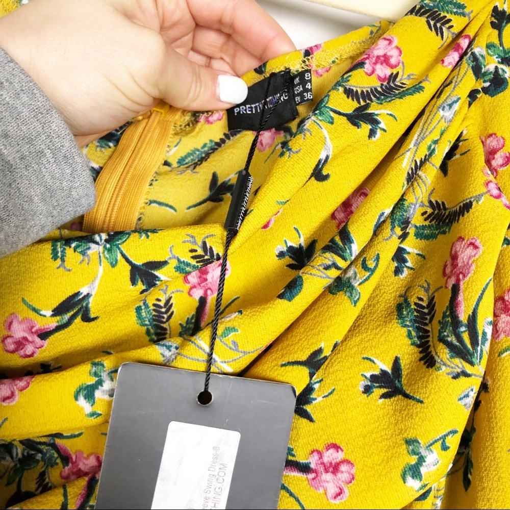 PrettyLittleThing mustard floral swing dress - Picture 3 of 5